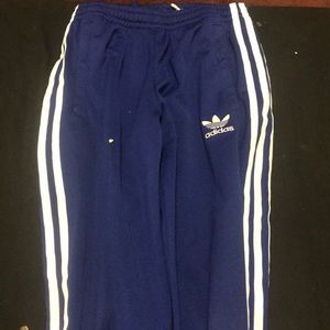 I am selling a blue adidas track sweats .